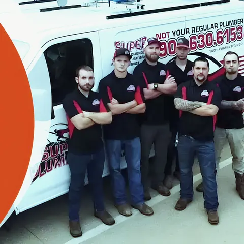Crew with branded vans (site banner with orange graphic on left), from Super Plumbers’s own photographs.